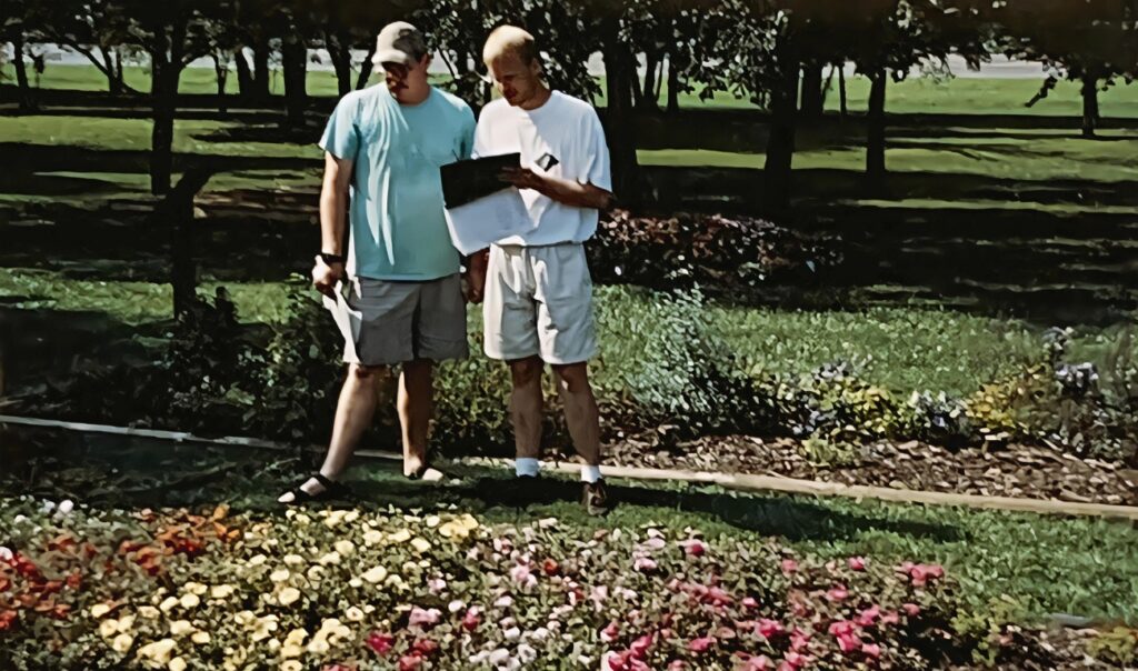 James Newburn in a garden