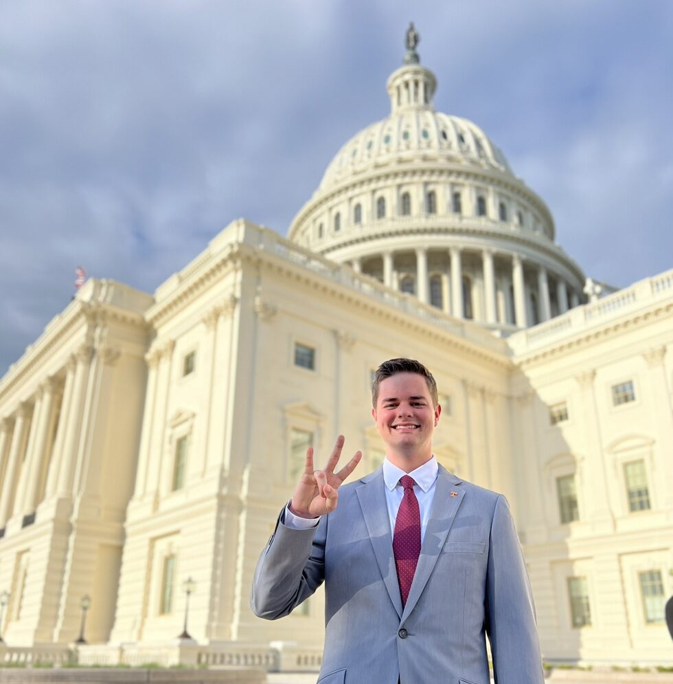 Bryce Mckenzie in front of the Capitol Building in Washington D.C.
