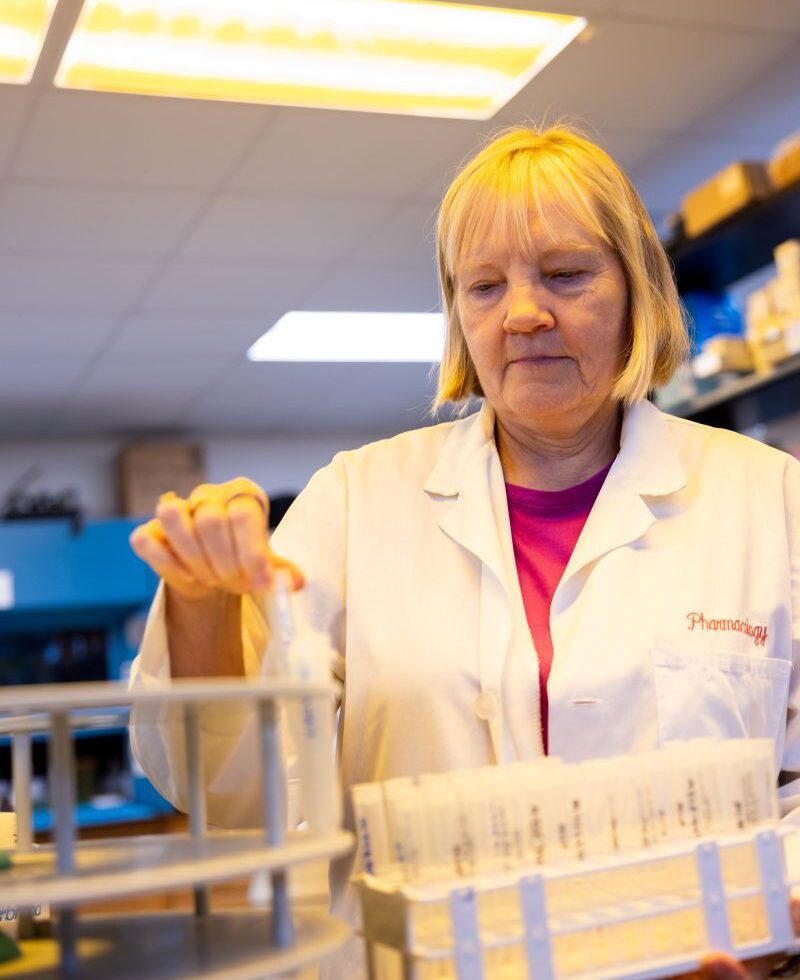 Sherry Cox working in a lab