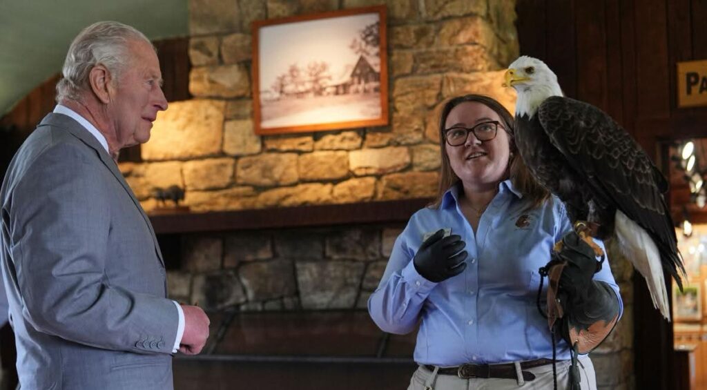Haley Williamson presenting a bald eagle to King Charles III.
