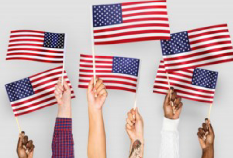 6 American Flags being held high
