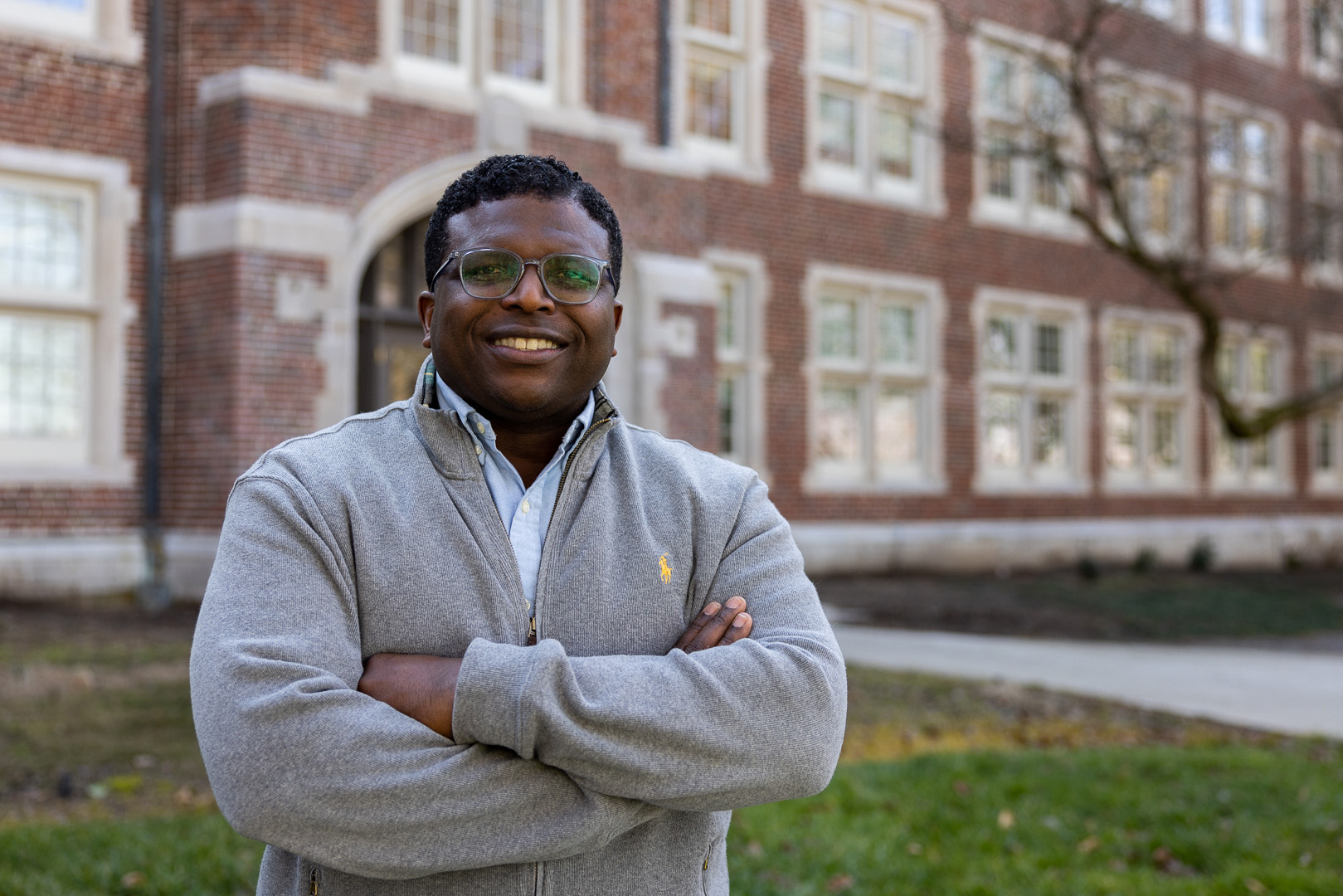 Andrew Muhammad standing in front of Morgan Hall