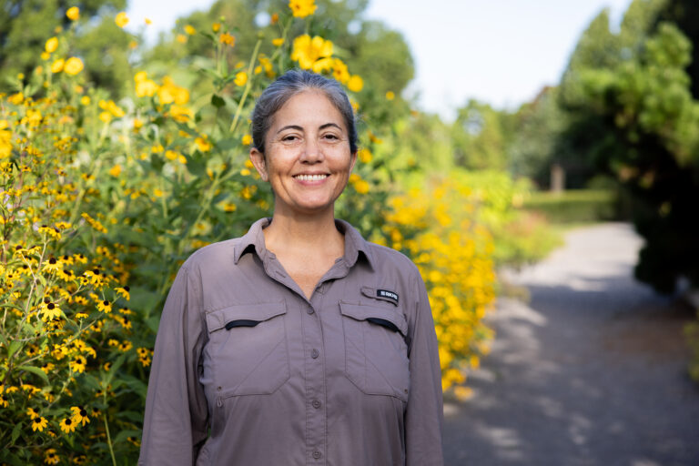 Holly Jones with yellow flowers