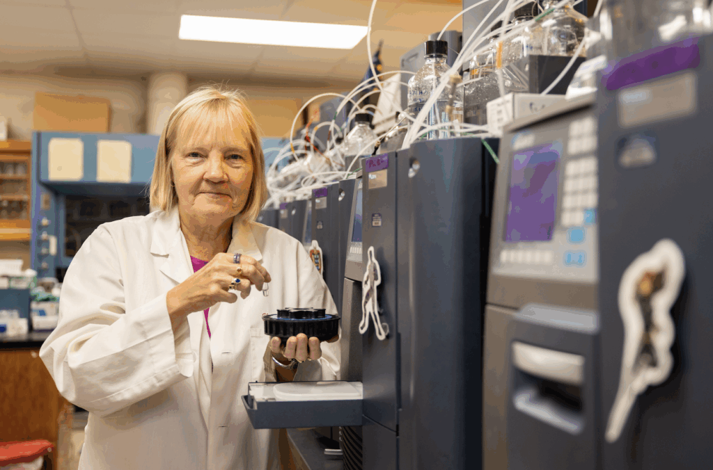 Sherry working on samples in the lab