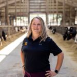 Liz Eckelkamp in a dairy barn