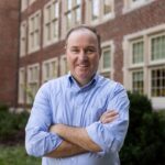 Jonathan Walton in front of Morgan Hall