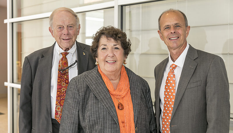 Tim Cross stands with Jim and Judi Herbert